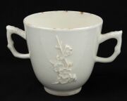 CHELSEA Blanc de Chine strawberry jug and two handled coffee cup, circa 1745, (2 items), impressed triangular mark to the base of the jug, 14cm high - 3