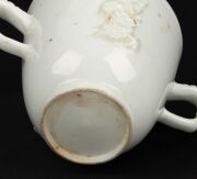 CHELSEA Blanc de Chine strawberry jug and two handled coffee cup, circa 1745, (2 items), impressed triangular mark to the base of the jug, 14cm high - 5