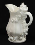 CHELSEA Blanc de Chine strawberry jug and two handled coffee cup, circa 1745, (2 items), impressed triangular mark to the base of the jug, 14cm high - 7