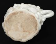 CHELSEA Blanc de Chine strawberry jug and two handled coffee cup, circa 1745, (2 items), impressed triangular mark to the base of the jug, 14cm high - 9