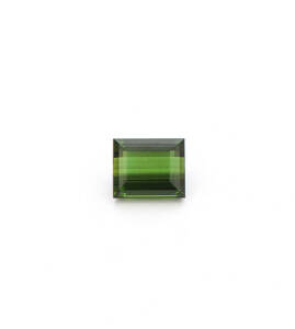 TOURMALINE: Modified rectangular step cut. Weight 13.39 carats.