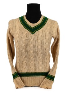 CLARRIE GRIMMETT'S 1930 AUSTRALIAN TEAM long sleeved jumper, with "Jaeger Pure Wool" label to inside collar and with additional label marked "C. GRIMMETT" in pen. The Jaeger Company, Ltd of Great Britain had an official contract with the Australian team. Provenance: The Clarrie Grimmett Collection; his family, by descent.