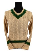 CLARRIE GRIMMETT'S 1930 AUSTRALIAN TEAM long sleeved jumper, with "Jaeger Pure Wool" label to inside collar and with additional label marked "C. GRIMMETT" in pen. The Jaeger Company, Ltd of Great Britain had an official contract with the Australian team.