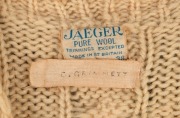 CLARRIE GRIMMETT'S 1930 AUSTRALIAN TEAM long sleeved jumper, with "Jaeger Pure Wool" label to inside collar and with additional label marked "C. GRIMMETT" in pen. The Jaeger Company, Ltd of Great Britain had an official contract with the Australian team. - 2