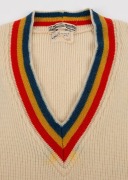 CLARRIE GRIMMETT'S SOUTH AUSTRALIAN TEAM, circa 1930 woollen jumper with blue, yellow and red colours to cuffs and collar; "Australknit S.A." maker's label, "The Big Store John Martin's Mens & Boys Outfitters Adelaide" retailer's label and ownership label - 3