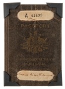 CLARRIE GRIMMETT'S AUSTRALIAN COMMONWEALTH PASSPORT issued in 1926, renewed in 1930 and again in 1934 for each of Grimmett's Australian Test Tours to England; with 13 pages of visas for various European ports-of-call, as well as Colombo, North America and - 2