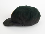 ALAN CONNOLLY'S AUSTRALIAN "BAGGY GREEN" TEST CAP, from the 1969-70 Tour of India and Ceylon, green wool with embroidered Australian Coat-of-Arms & "1969" on front, Australian Manufacture label inside with initials "AC" to small pure wool label. Very good - 3