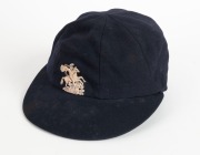 1965-66 ASHES SERIES IN AUSTRALIA: English&nbsp;Cricket Cap in deep blue with embroidered 'St George and the Dragon' on the front, worn by English fast bowler Jeff Jones during the series and exchanged with Graham McKenzie. The name "I.J.Jones" is hand-written - 2