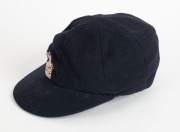 1965-66 ASHES SERIES IN AUSTRALIA: English&nbsp;Cricket Cap in deep blue with embroidered 'St George and the Dragon' on the front, worn by English fast bowler Jeff Jones during the series and exchanged with Graham McKenzie. The name "I.J.Jones" is hand-written - 3