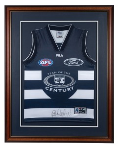 GEELONG: Team of the Century souvenir guernsey, signed by #15, Peter Riccardi. Framed and glazed, overall 101 x 79cm.