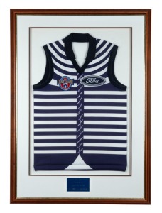 GEELONG: VFL/AFL 100th Anniversary Re-enactment Match Geelong jersey. Framed and glazed, overall 107 x 75cm.
