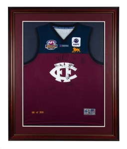 BRISBANE LIONS / FITZROY: 2003 Heritage Round limited edition jumper, #66/200, signed by eight team members. Framed and glazed, overall 103 x 84cm.