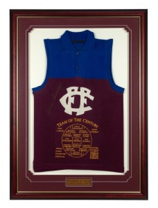 FITZROY FOOTBALL CLUB: Team of the Century commemorative jumper, signed by team great Kevin Murray, together with Certificate of Authenticity. Framed and glazed, overall 110 x 79cm.