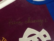 FITZROY FOOTBALL CLUB: Team of the Century commemorative jumper, signed by team great Kevin Murray, together with Certificate of Authenticity. Framed and glazed, overall 110 x 79cm. - 2