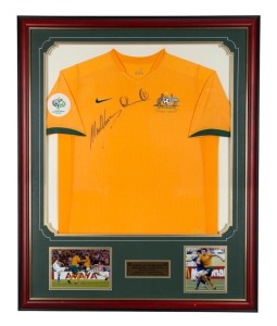 SOCCEROOS: 2006 FIFA World Cup Australian team shirt, signed by Harry Kewell and Mark Viduka. Framed and glazed, overall 112 x 90cm. With CofA.