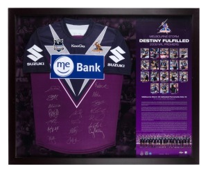 MELBOURNE STORM "Destiny Fulfilled" 2009 NRL Premiership display featuring a commemorative Grand Final jumper signed by the team, together with photographs of the team and a description of the day. NRL memorabilia security code, limited edition 74/100 and Certificate of Authenticity verso. Framed and glazed, overall 92 x 112cm.