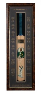 SIR DONALD BRADMAN portrait bat, signed by Bradman, with a numbered plaque (No.1446) affixed; attractively presented in a custom-made display case with details of Bradman's career. Accompanied by a Certificate of Authenticity.