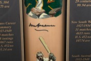 SIR DONALD BRADMAN portrait bat, signed by Bradman, with a numbered plaque (No.1446) affixed; attractively presented in a custom-made display case with details of Bradman's career. Accompanied by a Certificate of Authenticity. - 3