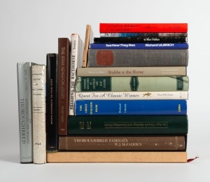 A shelf of hard cover books including "Thoroughbred Sires of Australia and New Zealand" by McFadden [1962], "Thoroughbred Families of Australia and New Zealand" by McFadden [1969],  "The Star Kingdom Story" by Pring [1983], "The Great Stallion Book" by Ul