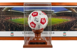 The 1992 FA CUP FINAL - LIVERPOOL 2 - SUNDERLAND 0 A souvenir Liverpool Football Club football signed by the team members, including Michael Thomas and Ian Rush, who kicked the two goals. Attractively presented in a perspex case with a fitted timber base. With CofA. Accompanied by a framed panoramic poster of Liverpool FC on the pitch at Anfield. (2 items).