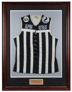 Port Adelaide lace-up guernsey worn by Nathan Buckley in the 1992 SANFL Grand Final, in which Port defeated Glenelg by 56 points. Framed & glazed. Buckley won the Jack Oatey Medal for being best on ground in that game, completing a barnstorming season in 