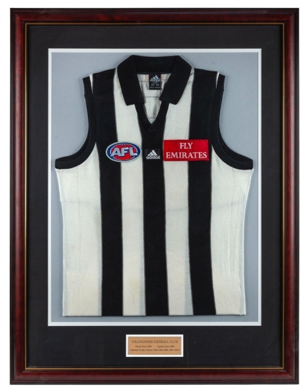 Nathan Buckley’s Collingwood guernsey circa 2000. With plaque attached reading: ‘COLLINGWOOD FOOTBALL CLUB Played since 1994. Captain since 1999. Copeland Trophy Winner 1994, 1996, 1998, 1999, 2000.’ A framed presentation created at the conclusion of the