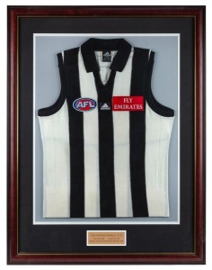 Nathan Buckley’s Collingwood guernsey circa 2000. With plaque attached reading: ‘COLLINGWOOD FOOTBALL CLUB Played since 1994. Captain since 1999. Copeland Trophy Winner 1994, 1996, 1998, 1999, 2000.’ A framed presentation created at the conclusion of the 2000 season.