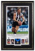 “Nathan Buckley – 2003 Brownlow Medallist”, framed & glazed display, with replica Brownlow Medal. Signed by Buckley. Limited edition #5 of 250.