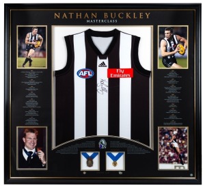 “Nathan Buckley Masterclass”, display comprising of a signed Collingwood jumper, window mounted with four photographs and replica Norm Smith & Brownlow Medals. Limited edition 5/200, framed & glazed, overall 188 x 117cm.