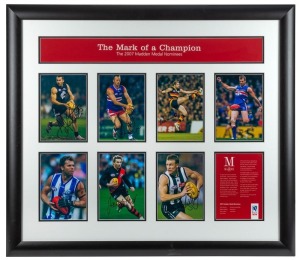 “The Mark of a Champion”. Framed & glazed display produced by AFLPA and presented to each of the 2007 Madden Medal nominees. Featuring autographed photos of Anthony Koutifides, Glenn Archer, James Hird, Chris Grant, Mark Ricciuto, Nathan Buckley and Luke Darcy. This was the inaugural year of the Madden Medal, named in honour of former AFL Players Association presidents and champion Essendon and Carlton players, Simon Madden and Justin Madden.
