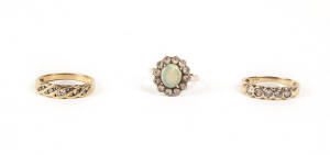 RINGS: Gold opal and white sapphire ring; two gold stone set rings.