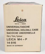 LEITZ: Brown leather Leica camera bag with carry strap, instruction sheet, and original retail swing tag. Featuring the words 'Leica 1913-1983' embossed near base of bag. Comes with original box, indicating that it is designed for the Leica M4-P. - 2