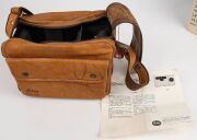 LEITZ: Brown leather Leica camera bag with carry strap, instruction sheet, and original retail swing tag. Featuring the words 'Leica 1913-1983' embossed near base of bag. Comes with original box, indicating that it is designed for the Leica M4-P. - 3