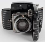 KODAK: Circa 1936 Bantam Special 828 film camera [#10294], with Ektar 45mm f2 lens and Compur-Rapid shutter. Much admired for its black and silver Art Deco&nbsp;styling. - 4