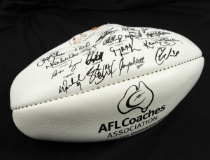 AFL Coaches Association 2013 commemorative souvenir football; white with printed signatures of all captains and coaches.