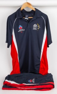 Buckley's AIS polo shirt with AIS and Australian Sports Commission badging. Dark blue with white and red striping. Plus, a pair of AIS branded track pants in dark blue with white and red piping. (2 items).