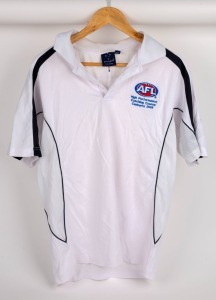 Polo shirt worn by Nathan Buckley while on the AFL’s High Performance Coaching Course, held in Canberra in 2009.