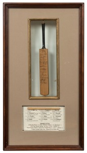 M.C.C. TOUR OF NEW ZEALAND, 1960-61: Miniature presentation bat headed "M.C.C. XI March,1961", signed by all twelve players in the touring party which was captained by D. R. W. Silk with W. Watson as Vice Captain. Accompanied by a miniature souvenir bat f