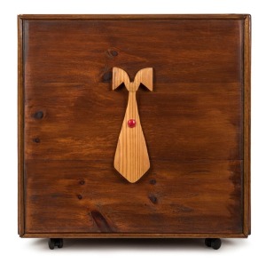A COLLECTION OF CRICKET TIES HOUSED IN A SUPERB CUSTOM BUILT TIMBER CHEST OF DRAWERS WITH REMOVABLE FRONT REVEALING THE NUMBERED AND LABELLED DRAWERS: More than 220 ties, including West Indies Tour 1950s, Singapore 1950s; Australian Test Team 1969/70 Tour; Lords Jubilee 1970; West Indies Tour 1971; Ashes Tour 1972; Madras Golden Jubilee 1974; World Cup 1975; Centenary Test Match 1977; India Tour to Australia 1977/78; World Cup 1979; World Cup 1982; India - World Cup Champions - 1983; Starlet Cri