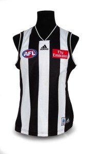 Nathan Buckley’s 2001 guernsey. Home guernsey made by adidas, with their label and AFL and Emirates branding; match worn by Buckley during the 2001 season. Unframed.