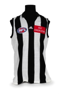Nathan Buckley’s Collingwood guernsey 2000. Home guernsey made by Sekem ("To fit chest 115cm"), with AFL, adidas and Emirates branding. Match worn by Buckley during the 2000 season. Unframed.