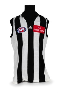 Nathan Buckley’s Collingwood guernsey 2000. Home guernsey made by Sekem ("To fit chest 115cm"), with AFL, adidas and Emirates branding. Match worn by Buckley during the 2000 season. Unframed.