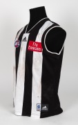 Nathan Buckley’s 2003 home-and-away season match-worn guernsey. This was a stellar season in Buckley’s glittering career as he not only captured another Copeland Trophy but also shared the Brownlow medal with Adelaide’s Mark Ricciuto and Sydney’s Adam Goo - 2