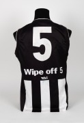 Nathan Buckley’s 2003 home-and-away season match-worn guernsey. This was a stellar season in Buckley’s glittering career as he not only captured another Copeland Trophy but also shared the Brownlow medal with Adelaide’s Mark Ricciuto and Sydney’s Adam Goo - 4