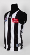 Nathan Buckley&rsquo;s 2004 Heritage Round guernsey. This jumper was similar in style to the one used in the 2003 Heritage Round, and was worn by Buckley in the game against Richmond on 31 July 2004. - 2