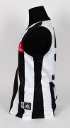 Nathan Buckley&rsquo;s 2004 Heritage Round guernsey. This jumper was similar in style to the one used in the 2003 Heritage Round, and was worn by Buckley in the game against Richmond on 31 July 2004. - 3