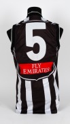 Nathan Buckley&rsquo;s Collingwood guernsey 2000. Away guernsey&nbsp;made by adidas ("X LARGE") match worn by Buckley during the 2000 season, with Magpie in oval on front, blue Primus logo on front and &lsquo;shield&rsquo; style number / Emirates patch on rear. Also with adidas - 4