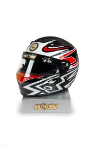 HSV 20th Anniversary Commemorative racing helmet; Number 40 of a limited edition of 500, signed by the four 2007 team members, Mark Skaife, Garth Tander, Rick Kelly and Todd Kelly; in original box with display stand.