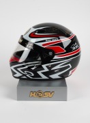 HSV 20th Anniversary Commemorative racing helmet; Number 40 of a limited edition of 500, signed by the four 2007 team members, Mark Skaife, Garth Tander, Rick Kelly and Todd Kelly; in original box with display stand. - 2