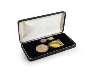 MAUREEN CAIRD'S AUSTRALIAN SPORTS MEDAL, awarded in 2000 and, accompanied by a miniature, in the original presentation case. Together with the official certificate of citation (signed by Prime Minister, John Howard and William Deane, Governor-General) and